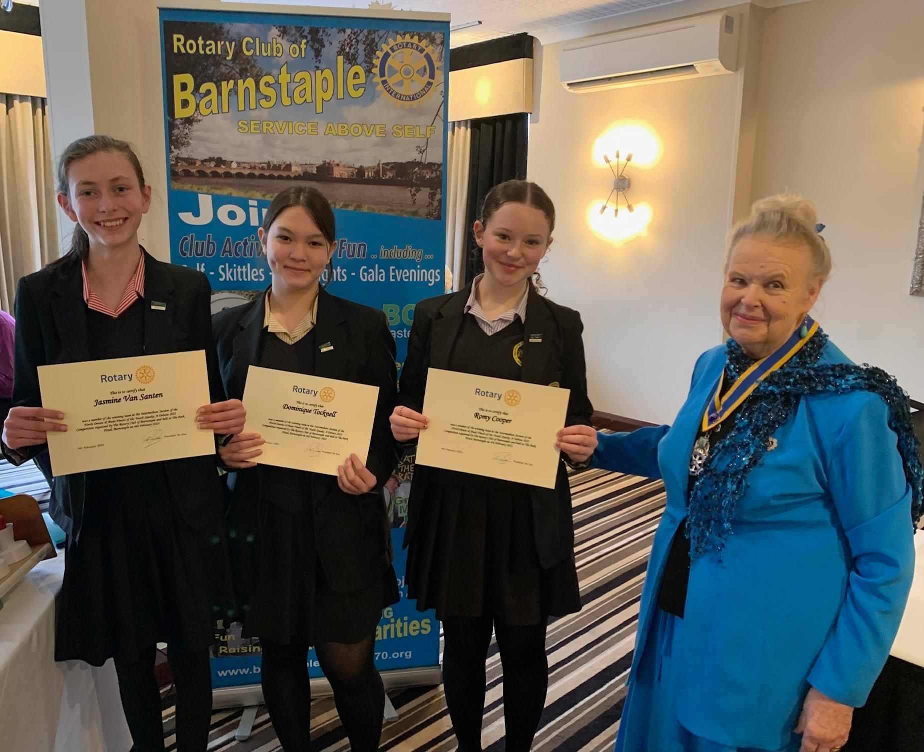 The Park Community School Youth Speaks team of Jasmine Van Santen, Dominique Tocknell, Romy Cooper with Rotarian Ro Day.