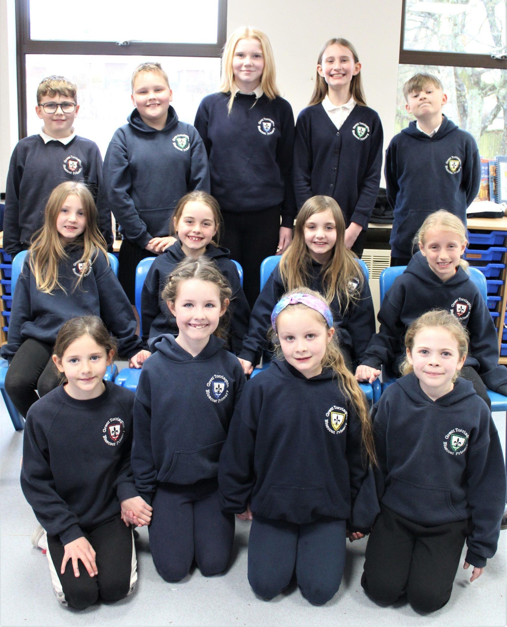 The 2023 Great Torrington May Queen Caitlin Sanders and the royal entourage.